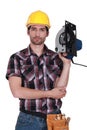 Man holding a saw Royalty Free Stock Photo