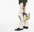 Man Holding Shopping Basket Concept