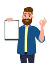 Man holding/showing a blank clipboard, report, record, document and showing okay/OK sign. Human emotion and body language concept. Royalty Free Stock Photo