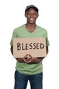 Man Holding Sign that says Blessed Royalty Free Stock Photo