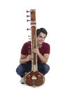 Man holding sitar