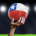 Man holding Soccer ball with Chilean flag Royalty Free Stock Photo