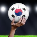 Man holding Soccer ball with South Korean flag Royalty Free Stock Photo