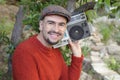 Man holding stereo boombox in the 1980s