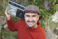 Man holding stereo boombox in the 1980s