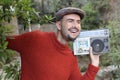 Man holding stereo boombox in the 1980s