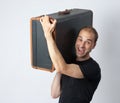 Man holding an suitcase Royalty Free Stock Photo