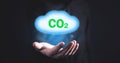 Man holding symbol CO2 with cloud Royalty Free Stock Photo