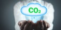 Man holding symbol CO2 with cloud Royalty Free Stock Photo