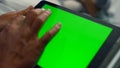 Man holding tablet computer with chroma key screen in clinic room close up. Royalty Free Stock Photo