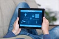 Man holding tablet with program smart home on the screen Royalty Free Stock Photo