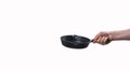 Man holding teflon frying pan on white background Royalty Free Stock Photo