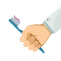 Man holding a toothbrush in his hand. Hygiene and caries prevent