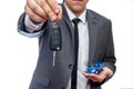 Man holding toy car and keys isolated on white Royalty Free Stock Photo