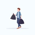 Man holding two garbage bags young guy housework concept male cartoon character full length flat Royalty Free Stock Photo