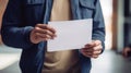 A man holding up a blank piece of paper, AI Royalty Free Stock Photo