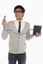 Man holding up an external hard disc Royalty Free Stock Photo