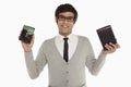 Man holding up an external hard disc Royalty Free Stock Photo