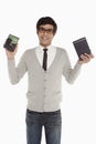 Man holding up an external hard disc Royalty Free Stock Photo