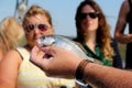 Man holding up fish for visitors to learn about whille on the Fishing Trawler LADY JANE, St.Simons Island,Georgia,2015