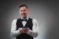 A man holding up poker chips. Poker Royalty Free Stock Photo