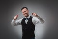 A man holding up red poker chips. Poker Royalty Free Stock Photo