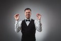 A man holding up red poker chips. Poker Royalty Free Stock Photo