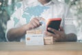 Man holding using smartphone connected browsing internet worldwide for shopping online. The concept of contactless payment Royalty Free Stock Photo