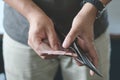 Man holding wallet with full of money Royalty Free Stock Photo