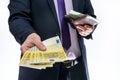 Man holding wallet and offering euro banknotes Royalty Free Stock Photo