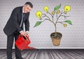 Man holding watering can and Drawing of Money and idea graphics on plant branches on wall