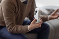 Man holding white controller in hands, and losing in game. Royalty Free Stock Photo