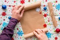 Man holding a wishlist on the background of snowflakes