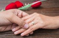 Man holding woman's hand with a ring Royalty Free Stock Photo