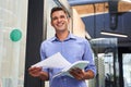 Man holding work documents