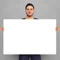 Man holding 24 x 36 canvas blank copy space selling art photo enlargement 3D illustration