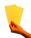 Man holding yellow flyers on white background, closeup. Mockup for design Royalty Free Stock Photo