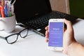 A man holds Apple iPhone 6 with Instagram application on the screen. App is largest and most popular photograph social networkin Royalty Free Stock Photo