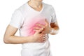 A man holds the Breasts. The pain in his chest. Heartburn. Stomach hurts. Sore point highlighted in red. Closeup. Isolated on Royalty Free Stock Photo