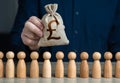 A man holds a british pound sterling money bag above the crowd. Deposits and loans. Budgetary funds for social policy. Salaries.