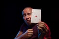 A man holds a deck of play cards Royalty Free Stock Photo