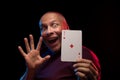 A man holds a deck of play cards Royalty Free Stock Photo