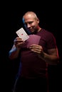 A man holds a deck of play cards Royalty Free Stock Photo