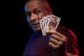 A man holds a deck of play cards Royalty Free Stock Photo