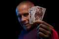 A man holds a deck of play cards Royalty Free Stock Photo