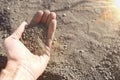 A man holds the earth in his hand the idea of the photo the soil is our life Royalty Free Stock Photo