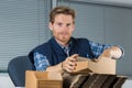 Man holds envelopes in office Royalty Free Stock Photo