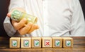 Man holds euro money above of blocks with permits documents. Bribe to obtain missing permits. Contract terms violation. Artificial Royalty Free Stock Photo