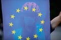 A man holds an European Union flag during an anti-government protest in Bucharest