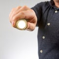 man holds a flashlight in his hand. item for camping and household life Royalty Free Stock Photo